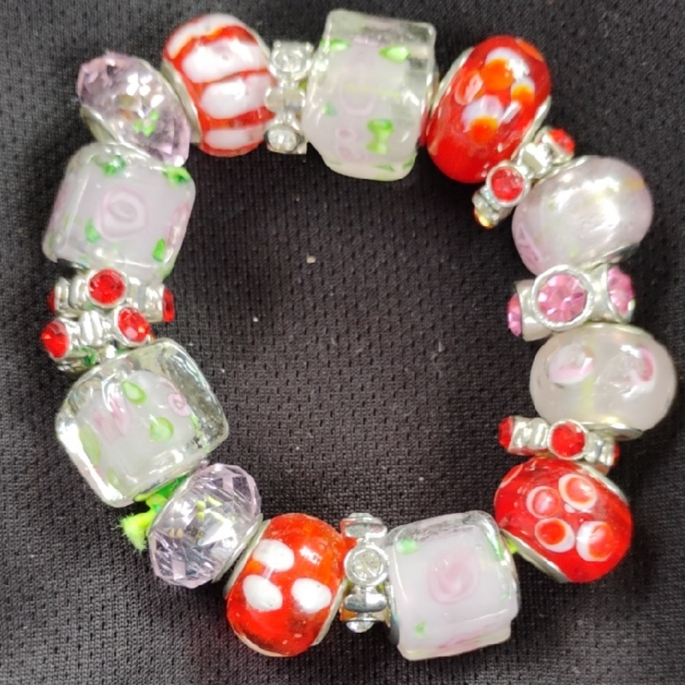 Red and Silver Beaded Bracelet with Decorative Accents